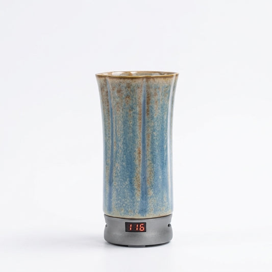 Portable electric incense burner for car and travel with a digital temperature display on a white background