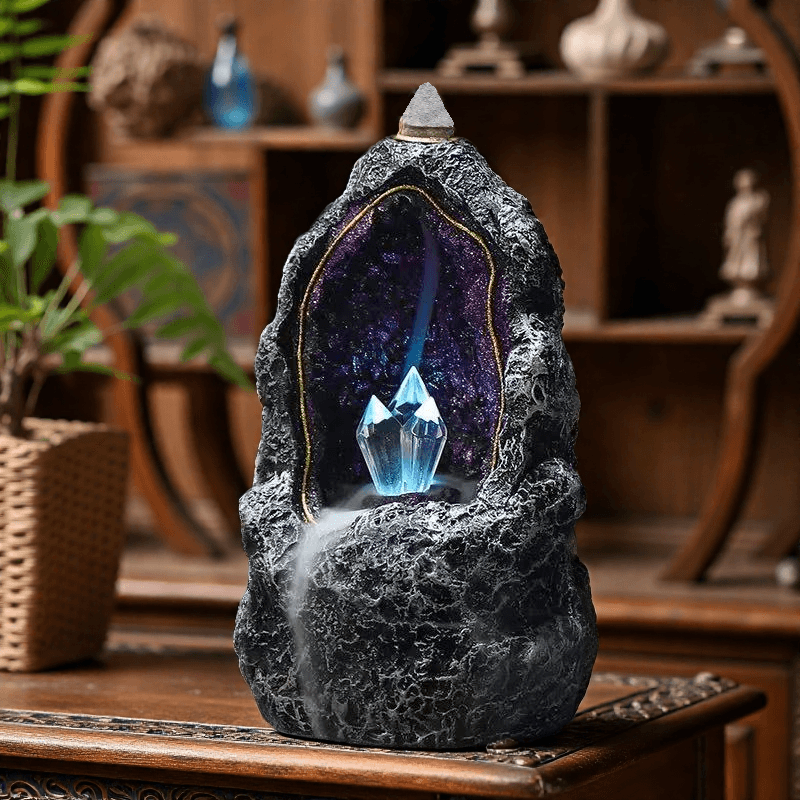 LED geode-style backflow incense burner with glowing crystal center and cascading smoke, battery-powered for mystical decor.
