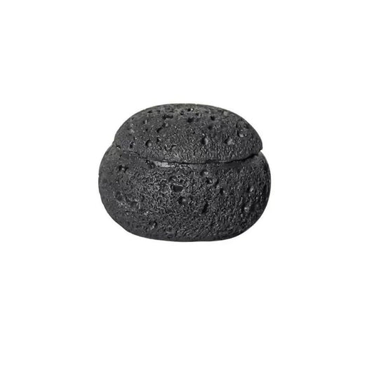 Top view of black cement incense burner lid featuring porous stone texture and airflow perforations, designed for heat diffusion and smoke circulation