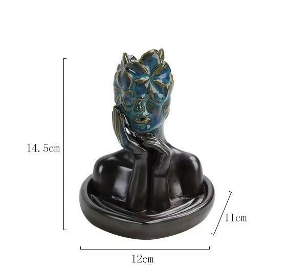 Dimensions of floral mask backflow incense burner with measurements 14.5cm height, 12cm width, 11cm depth