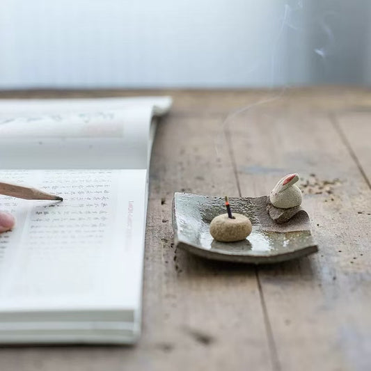 Handmade ceramic incense holder with rabbit figurine, artisanal incense burner for meditation, yoga, and home decoration.