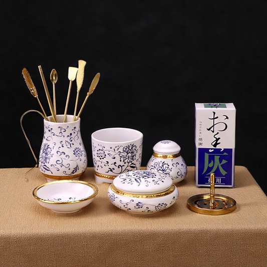 White porcelain incense burner set with brass tools and accessories