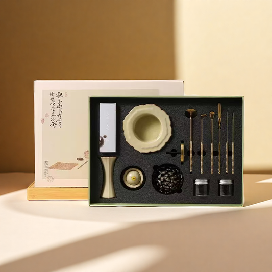 Complete Lotus Rain incense burner kit with ceramic burner, tools, and accessories in box