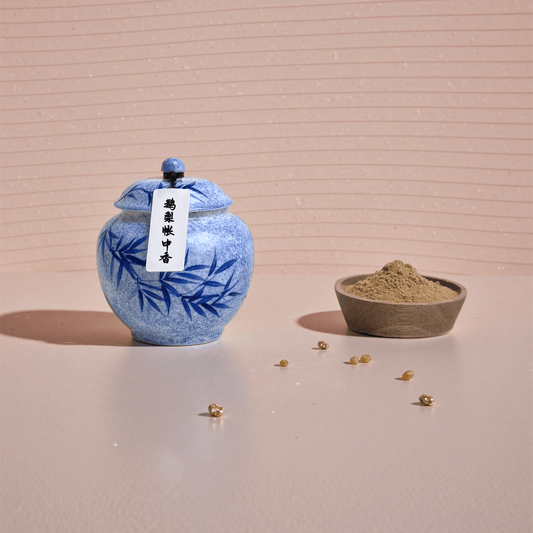 Midnight Pear handcrafted natural incense powder shown in a blue ceramic jar, with a small bowl displaying the fine powdered texture for aromatherapy and meditation.