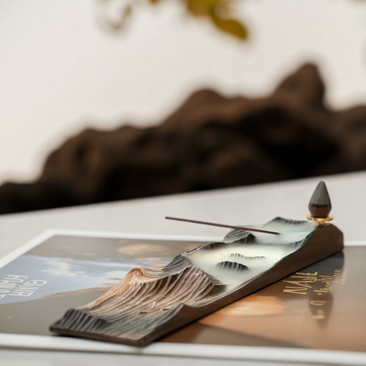 Mountain Mist Incense Set featuring a hand-carved wooden holder with backflow cone and incense stick in use, styled on a tabletop with natural lighting