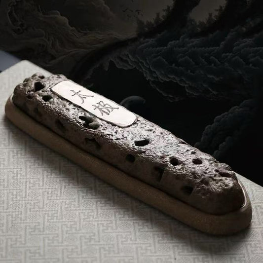 Rustic handmade ceramic incense holder box with volcanic rock texture and Chinese characters on top