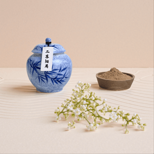 Silent Chapter natural incense powder in a blue ceramic jar, with loose powder displayed in a small bowl, made with jasmine, sandalwood, aloeswood, and frankincense.