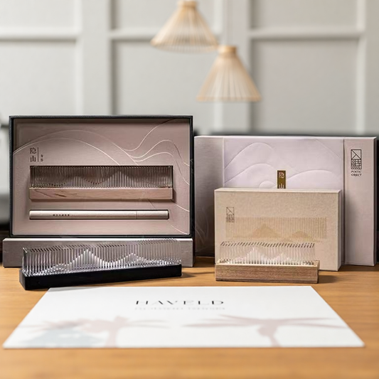 Transparent landscape incense burner gift set with acrylic holders and wood bases, shown in elegant packaging on tabletop