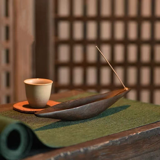 Wooden boat incense holder with tea setup