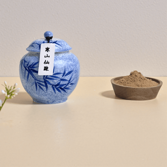 Cold Mountain Traces incense powder with a wooden bowl placed next to the jar for incense powder display purposes