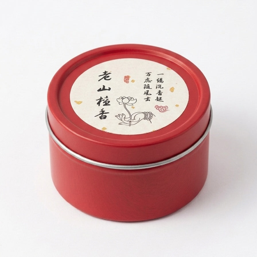 Red tin container for aged sandalwood incense coils with printed lid label on a white background