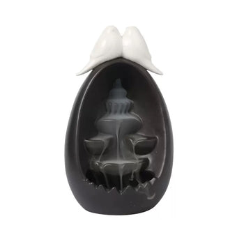 Front view of the Backflow Incense Burner Ceramic Waterfall with Doves, featuring a black ceramic waterfall design with two dove figures on top and tiered backflow channels for cascading incense smoke