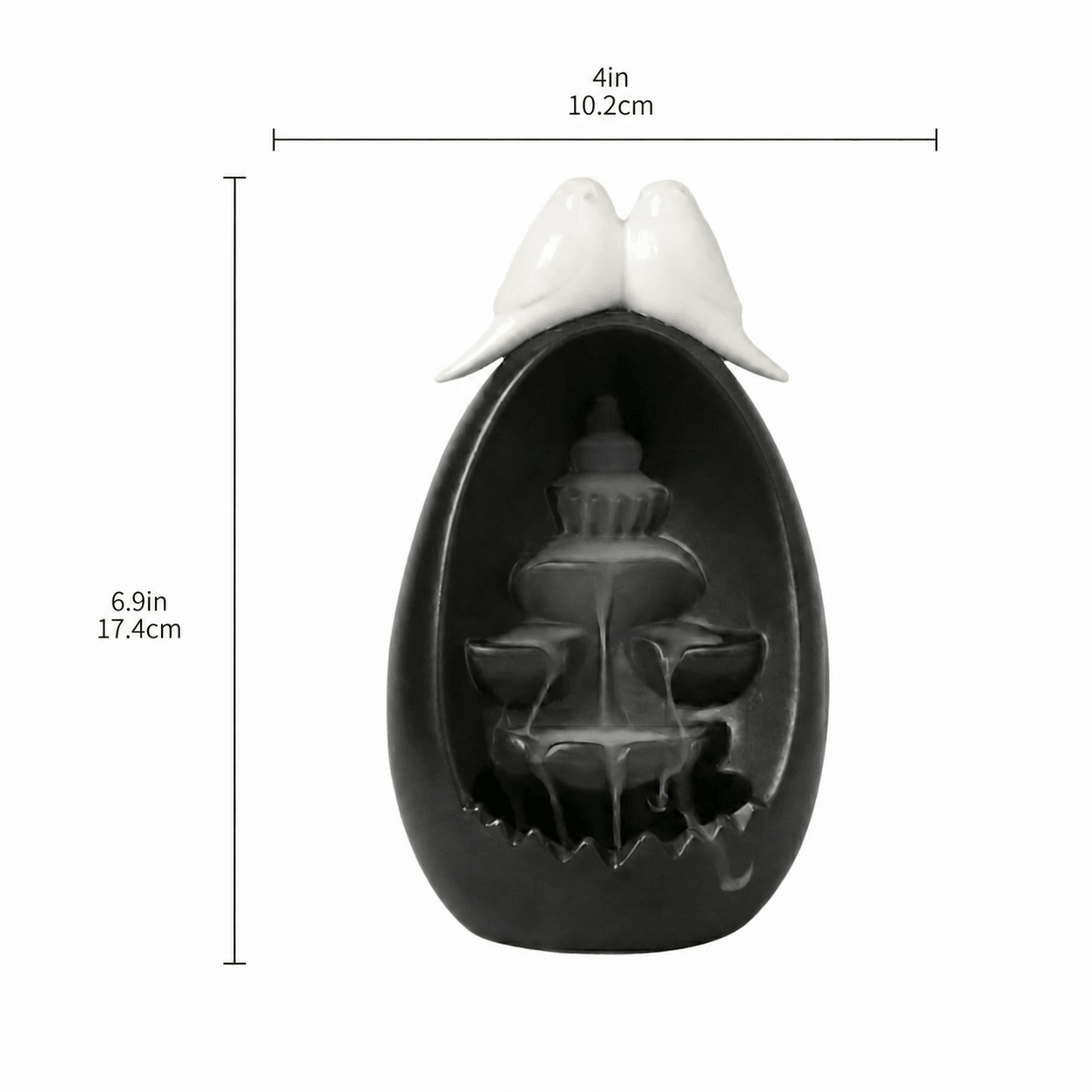 Ceramic backflow incense burner in a black oval waterfall design with two white doves on top, shown with size markings of 4 in / 10.2 cm width and 6.9 in / 17.4 cm height.