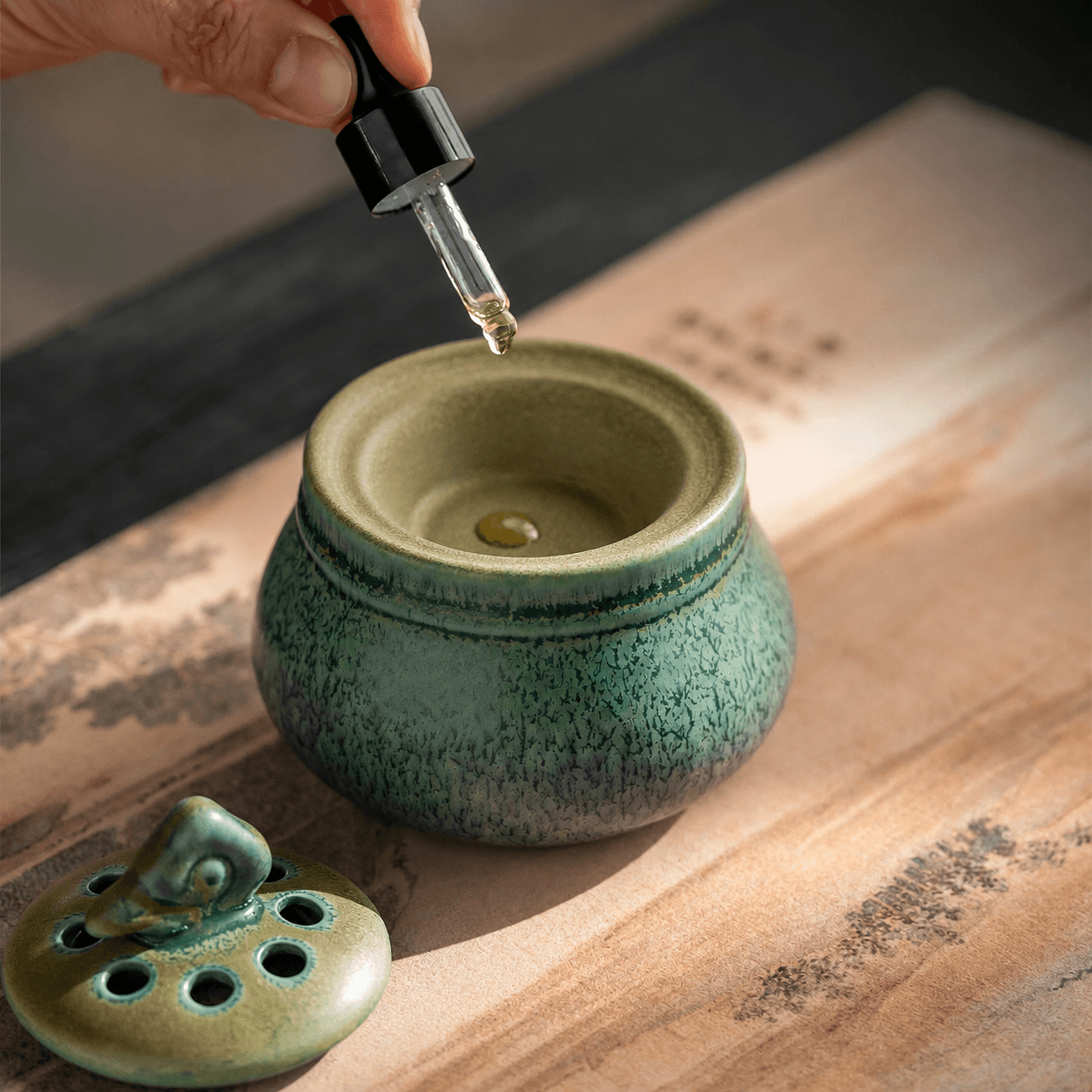 Ceramic electric incense burner with essential oil dropper, designed for flameless aroma heating, home fragrance, resin incense, incense chips, and daily relaxation use.