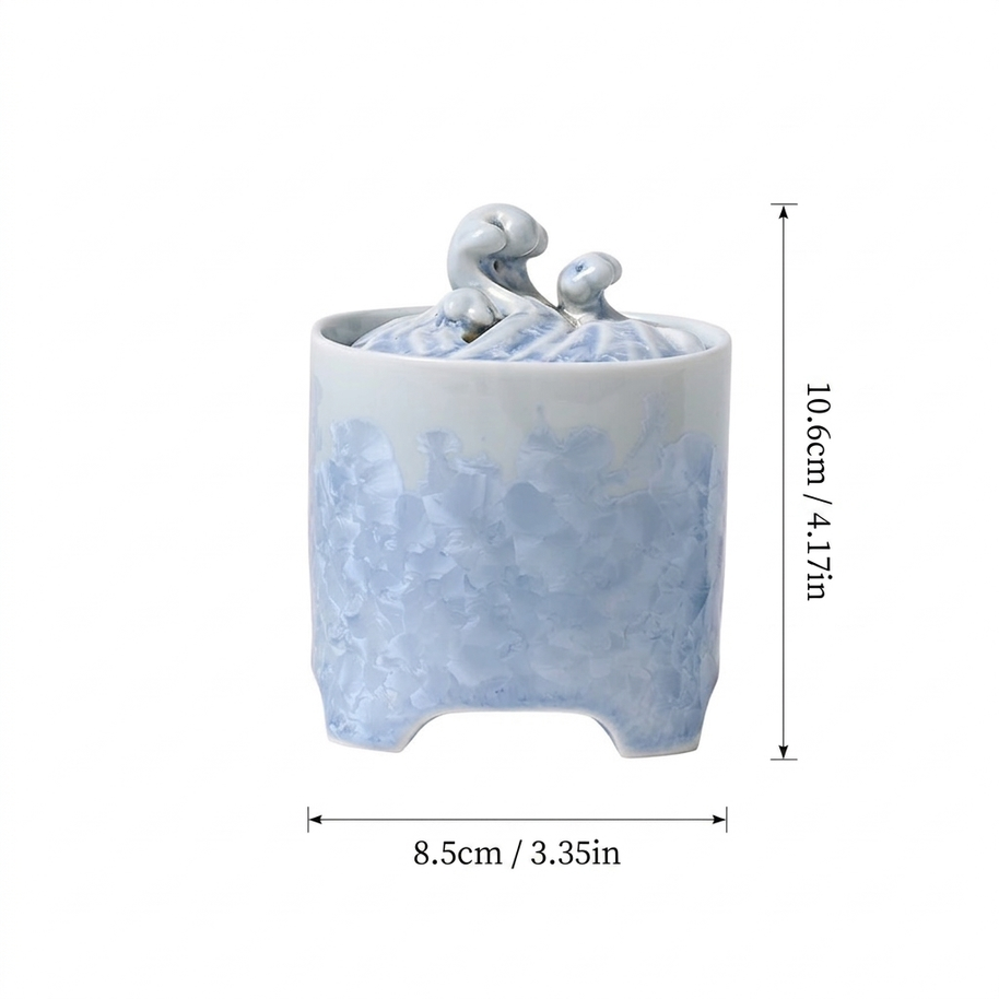 Blue and white crystalline glaze ceramic electric incense burner showing 8.5 cm width and 10.6 cm height dimensions.