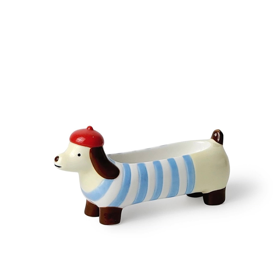 Ceramic dachshund incense holder with light blue stripes and a red beret, three-quarter front view on a white background.