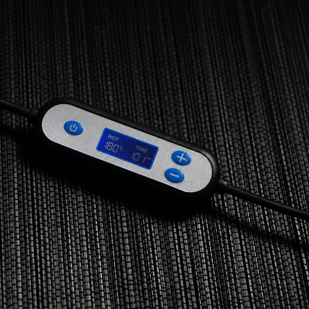 Digital temperature controller with LCD display showing temperature and timer settings for an electric ceramic incense burner