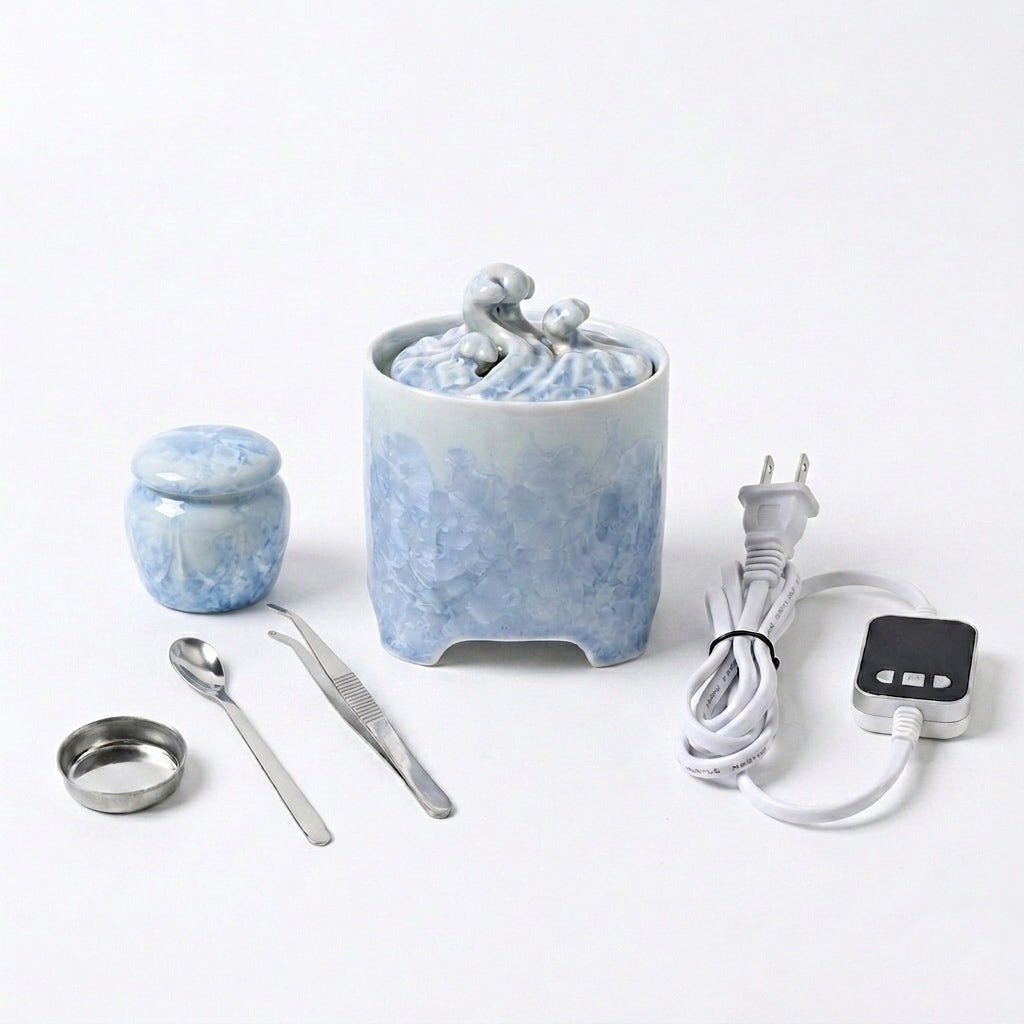 Blue and white crystalline glaze ceramic electric incense burner with digital temperature controller and incense tools.
