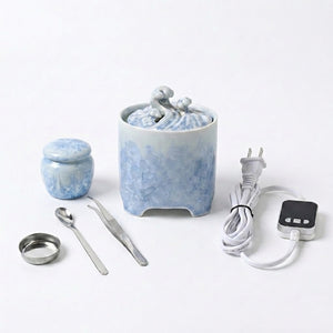 Blue and white crystalline glaze ceramic electric incense burner with digital temperature controller and incense tools.