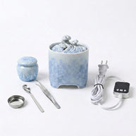 Blue and white crystalline glaze ceramic electric incense burner with digital temperature controller and incense tools.