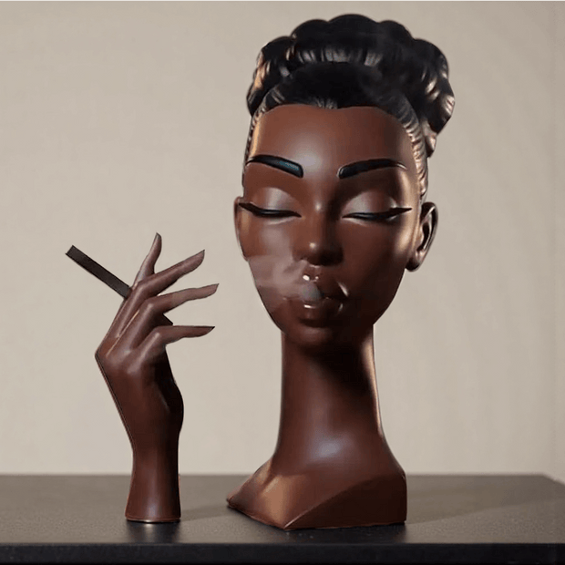 Backflow incense burner sculpture of a woman with smoke flowing from her mouth, artistic design for modern home décor