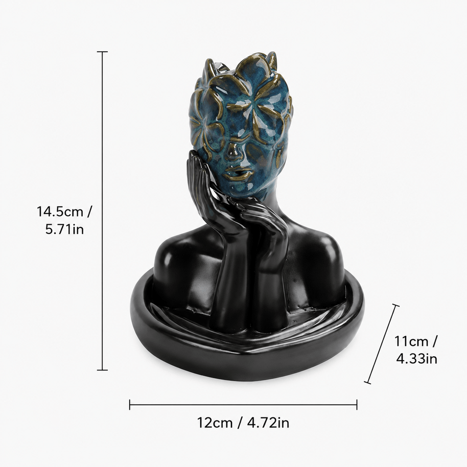  Dimensions of floral mask backflow incense burner with measurements 14.5cm height, 12cm width, 11cm depth