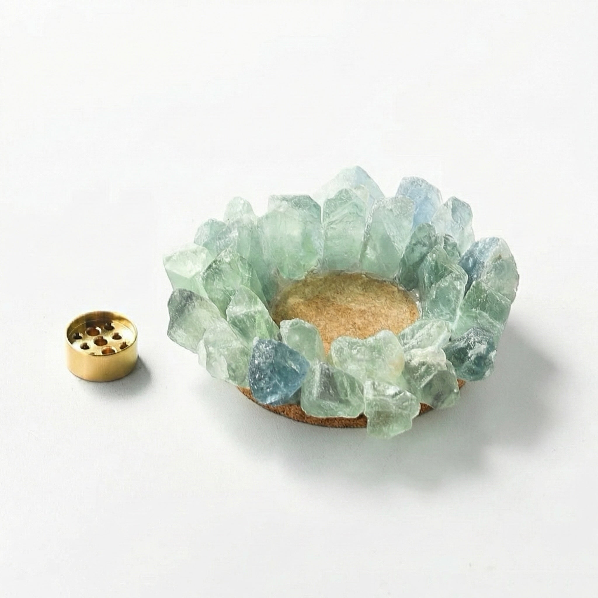 Raw green  crystal incense holder ring with removable brass insert displayed separately on white background