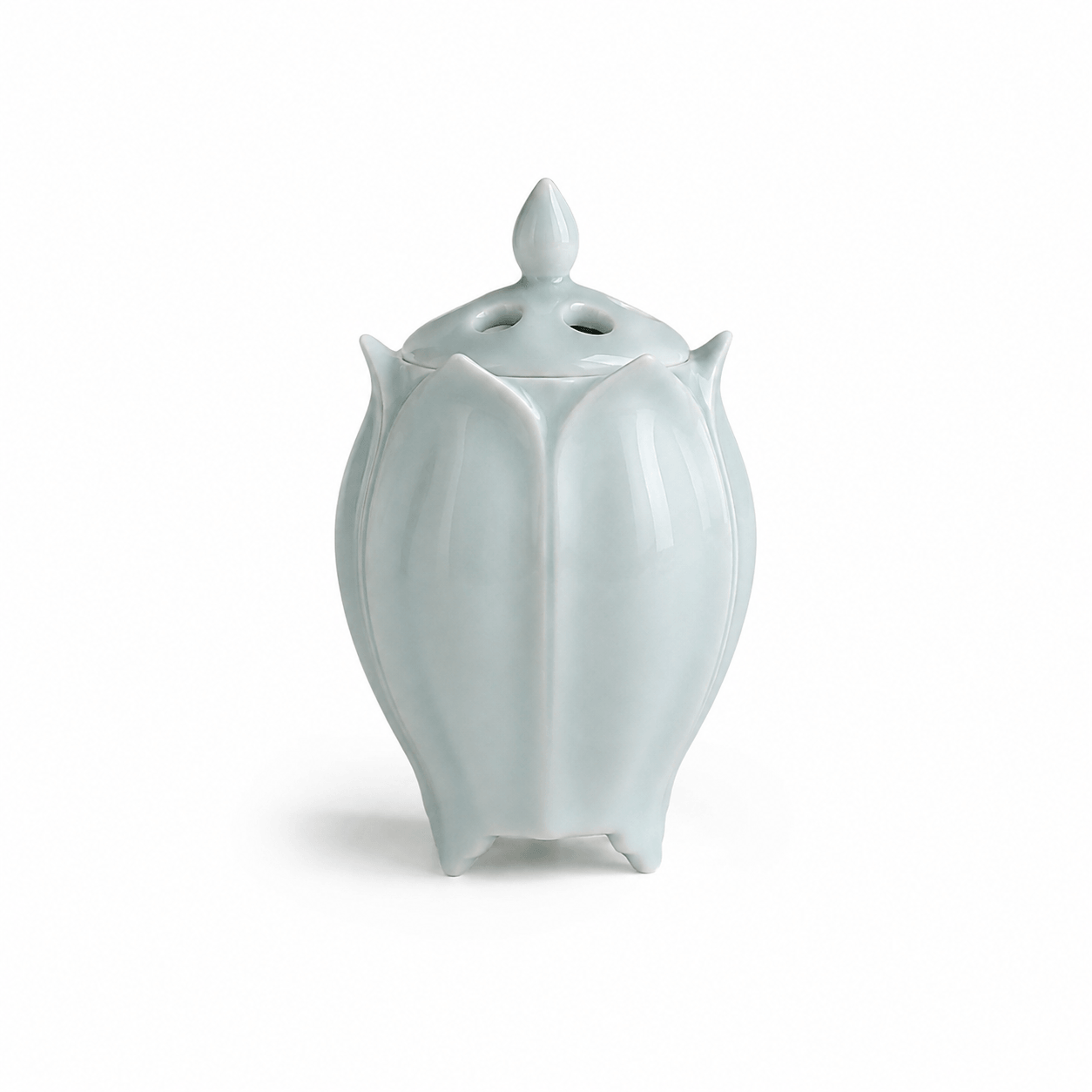 Green lotus shaped electric ceramic incense burner with a glossy finish on a white background