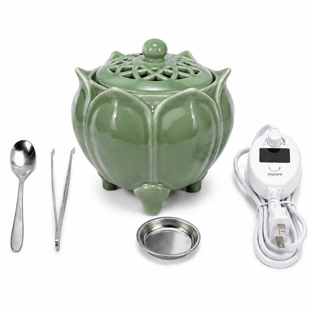 Green lotus shaped electric incense burner with digital temperature controller, spoon, tweezers, and metal incense dish on a white background