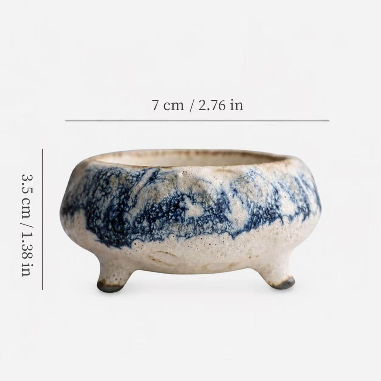 Size diagram of a handmade blue marbled ceramic incense holder showing a width of 7 centimeters and a height of 3.5 centimeters