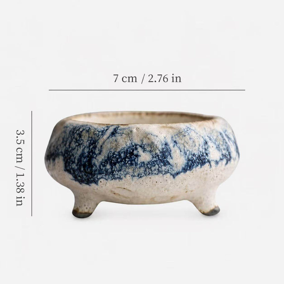 Size diagram of a handmade blue marbled ceramic incense holder showing a width of 7 centimeters and a height of 3.5 centimeters