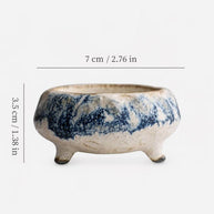 Size diagram of a handmade blue marbled ceramic incense holder showing a width of 7 centimeters and a height of 3.5 centimeters