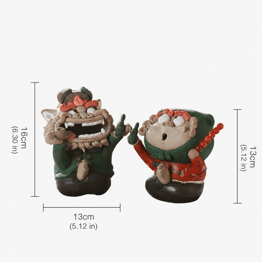 Size guide for the handmade quirky ceramic incense holder duo, showing approximate dimensions of the green lion figure and red figure on a white background