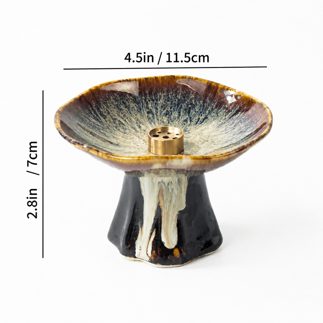 Japanese wabi-sabi style pedestal ceramic incense holder with reactive brown glaze and brass insert, showing size dimensions 4.5 in wide and 2.8 in high on a white background.