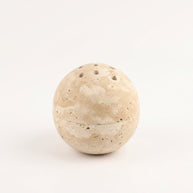 Natural travertine stone incense burner shaped like a smooth round sphere with small ventilation holes on the top and a horizontal seam around the middle, shown against a white background.