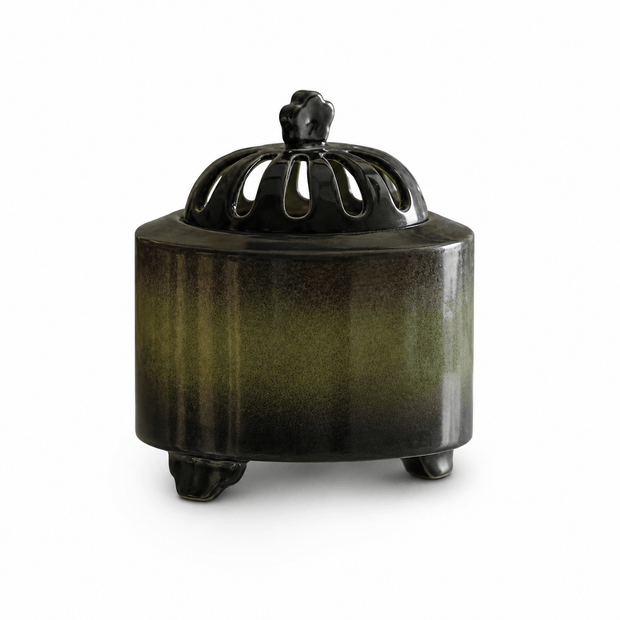 Obsidian black ceramic electric incense burner with a glossy gradient finish and vented dome lid displayed on a white background