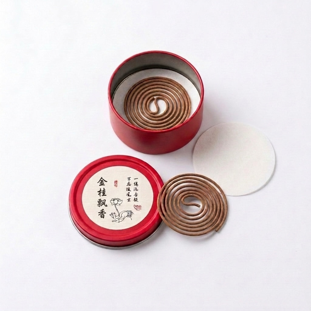 Osmanthus incense coils in an open red tin with pre-separated single coils and protective insert on a white background