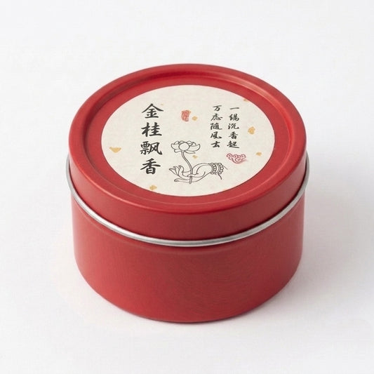 Red tin container for osmanthus incense coils with printed lid label on a white background