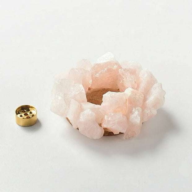 Raw pink rose quartz crystal incense holder ring with removable brass insert displayed separately on white background