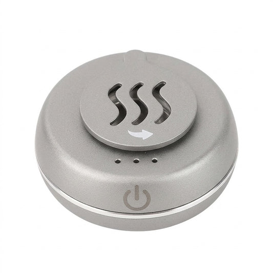 Silver portable electric car incense burner with a round compact body, vented rotating top cover, three indicator lights, and a front power symbol, shown on a white background.