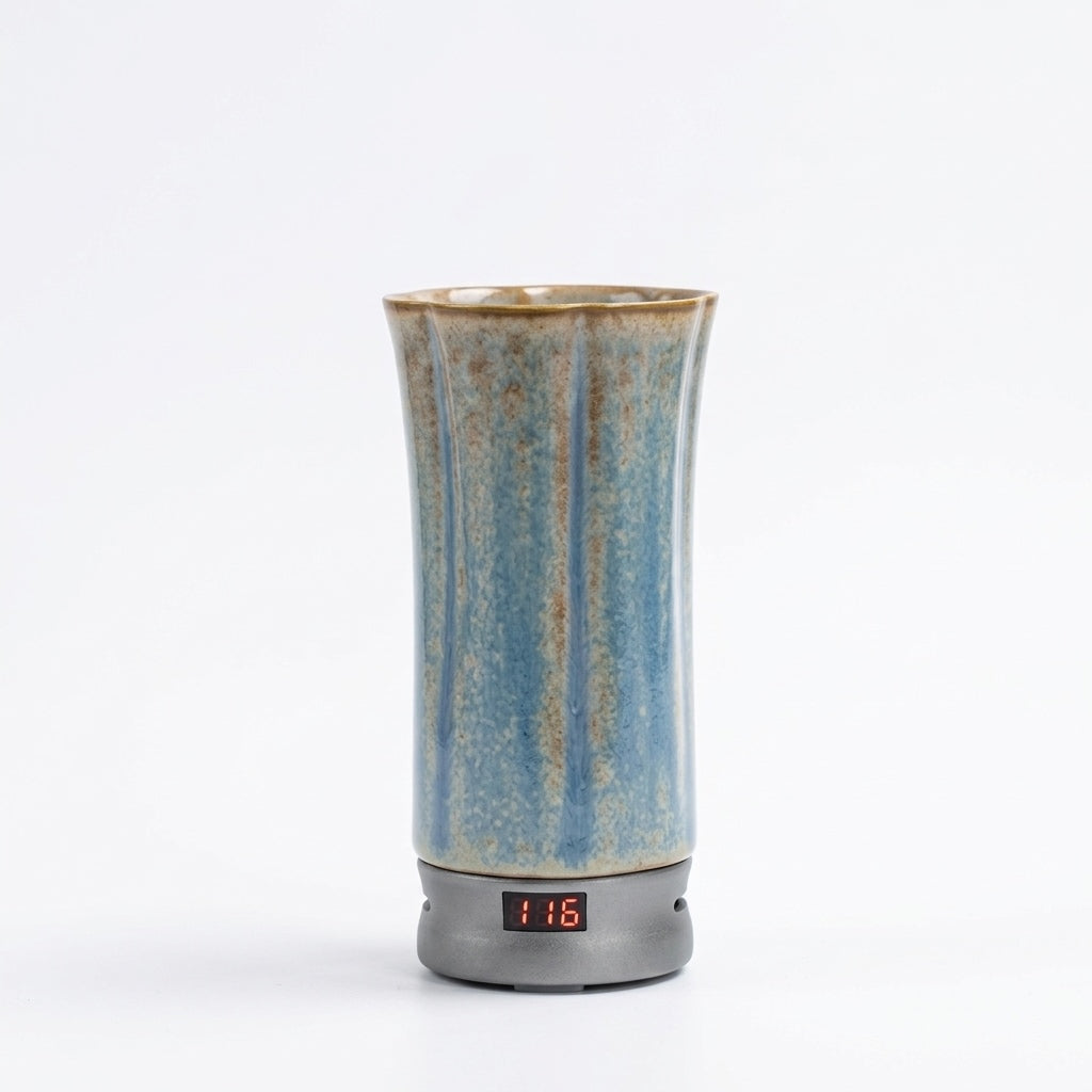 Portable electric incense burner for car and travel with a digital temperature display on a white background