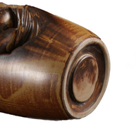 Close-up of the bottom base detail on a premium high-fired ceramic backflow incense holder with a rustic brown glaze