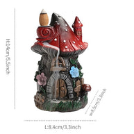 Product dimensions and size guide for the resin mushroom backflow incense burner fairy house. The diagram indicates the compact, versatile size measuring 5.5 inches (14cm) in height, 3.3 inches (8.4cm) in length, and 3.3 inches (8.5cm) in width. Perfectly sized for desks, shelves, or meditation altars.