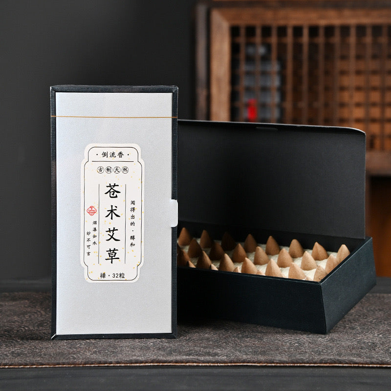 Wormwood backflow incense cones in a black box with mugwort herbal packaging for waterfall incense burner