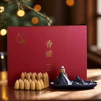 Elegant red gift box set featuring a ceramic mountain-shaped backflow incense burner and 20 natural agarwood cones, designed for relaxation and home decor