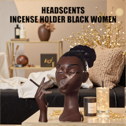 Backflow incense burner woman sculpture releasing smoke, styled in elegant home setting with gold decor and candles