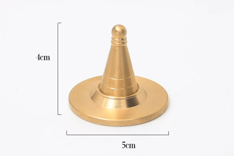 Front view of brass cone incense mold showing 4 cm height and 5 cm base diameter, photographed on white background