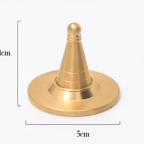Front view of brass cone incense mold showing 4 cm height and 5 cm base diameter, photographed on white background