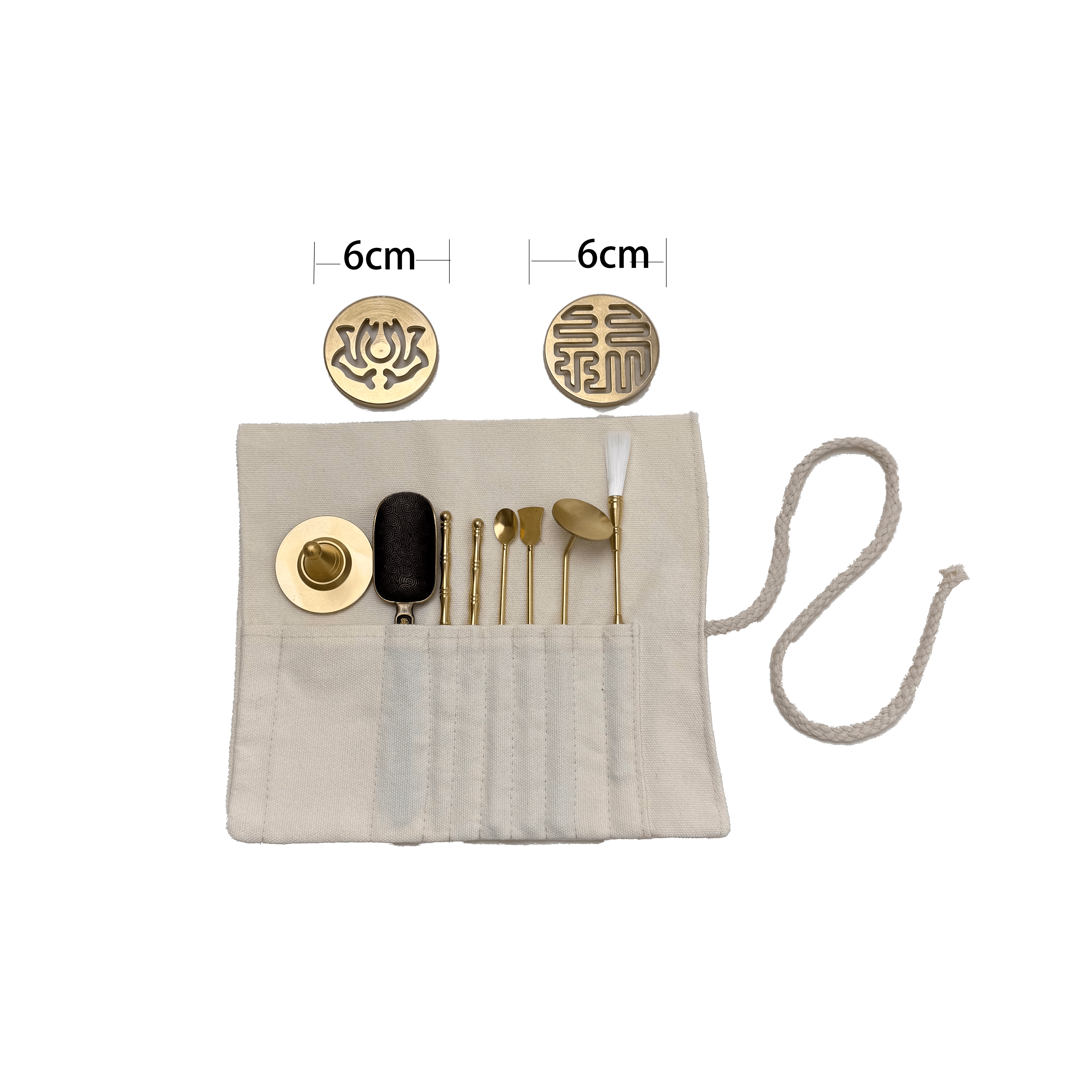 Top view of 8-piece brass incense stamp tool kit fully displayed on white background, including two 6 cm pattern molds and various incense tools in cloth wrap