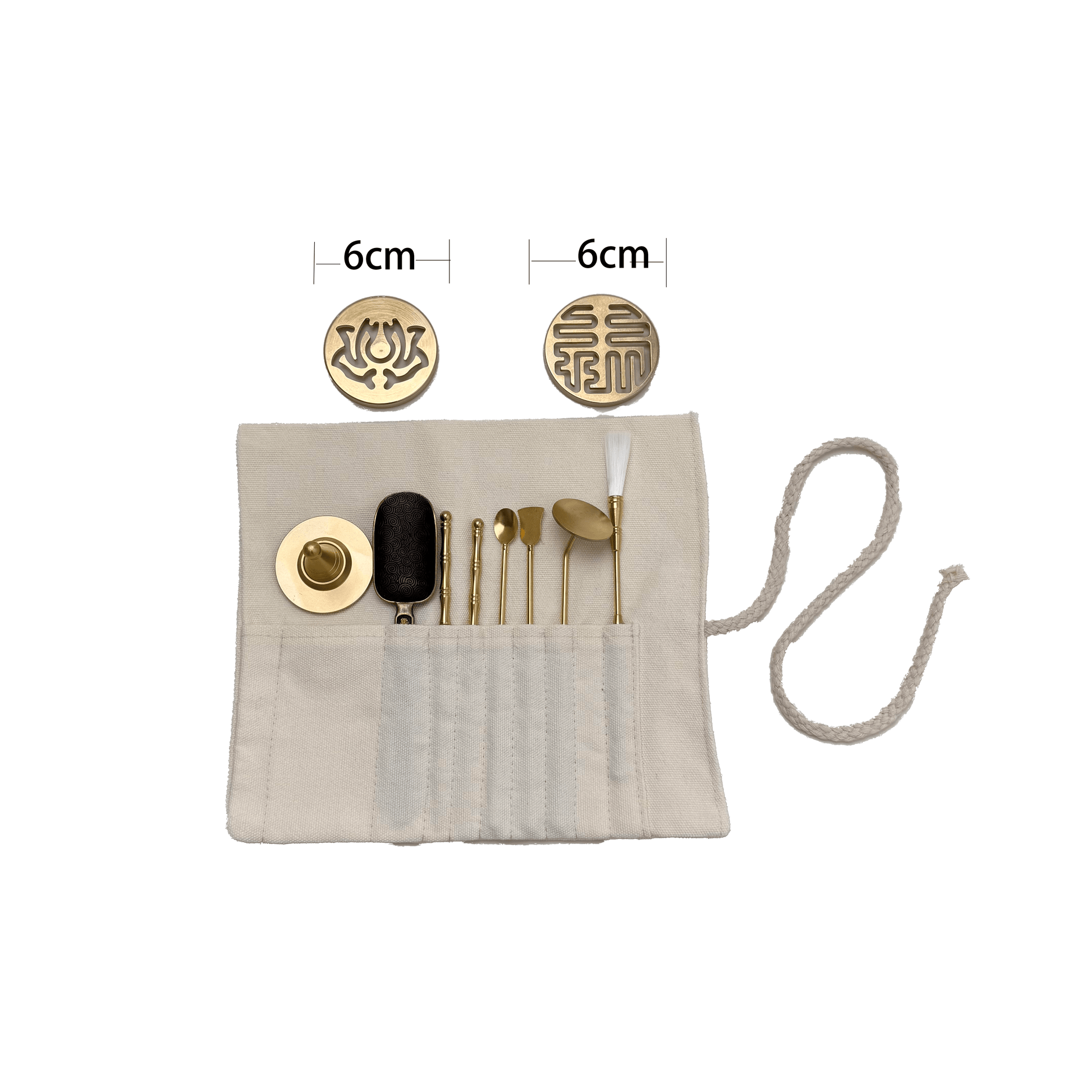 Top view of 8-piece brass incense stamp tool kit fully displayed on white background, including two 6 cm pattern molds and various incense tools in cloth wrap
